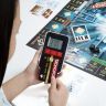 Hasbro B6677 Настольная игра Монополия с банковскими картами "Банк без границ"