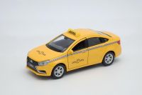 Welly 43727TI Машинка Welly LADA Vesta Такси металлическая 1:34-39