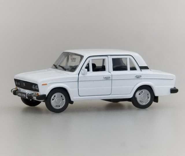 Welly 42381W Машинка металлическая 1:34-39 LADA 2106.