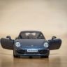 RMZ City 554010M Машина металлическая Porsche 911 Carrera S (2012), инерционная, темно-синий матовый цвет, 1:32