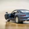 RMZ City 554010M Машина металлическая Porsche 911 Carrera S (2012), инерционная, темно-синий матовый цвет, 1:32